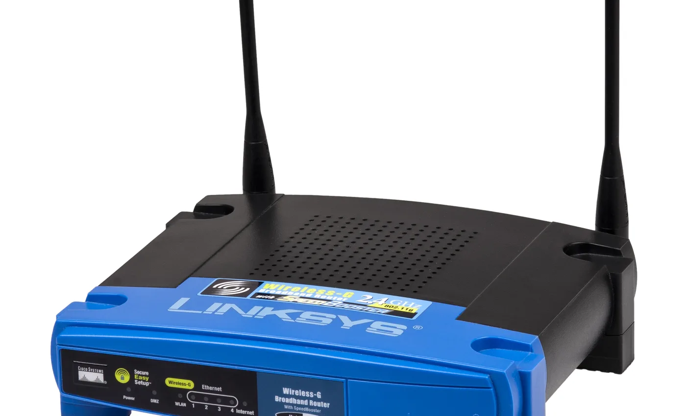 Ασύρματο router πάνω σε λευκό φόντο για οδηγό σταθερού Wi-Fi